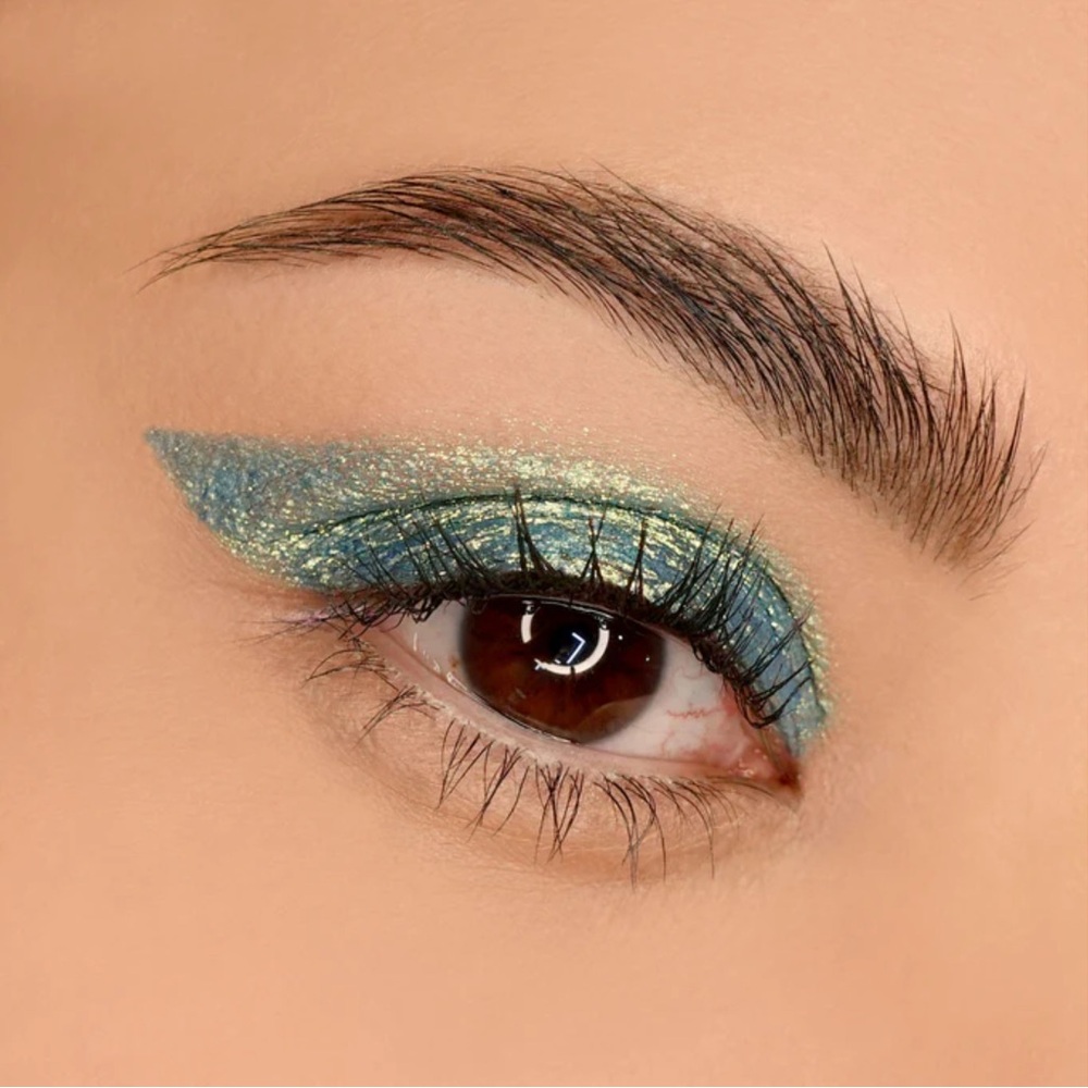 Jeffree Star Another Realm Liquid Star Shadow- blue green w/ gold metallic shift
